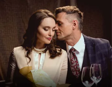 A dressed-up couple enjoying an evening together
